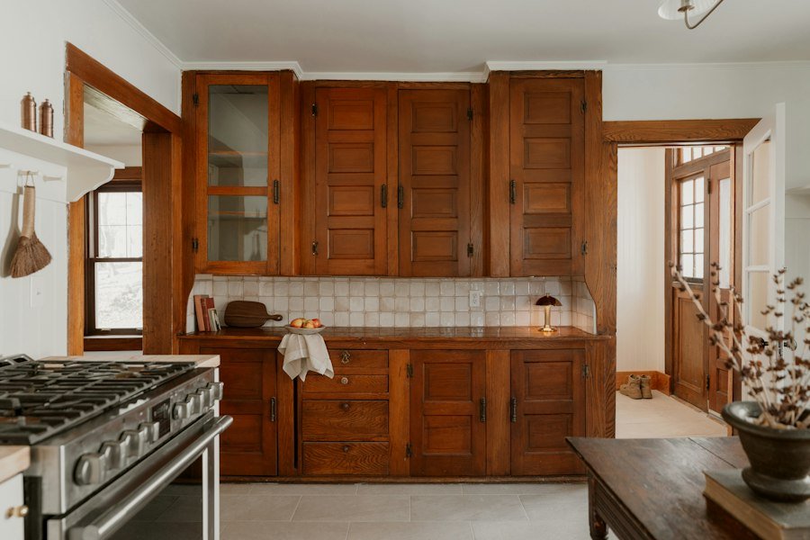 Kitchen with warm wooden cabinets and a tiled backsplash